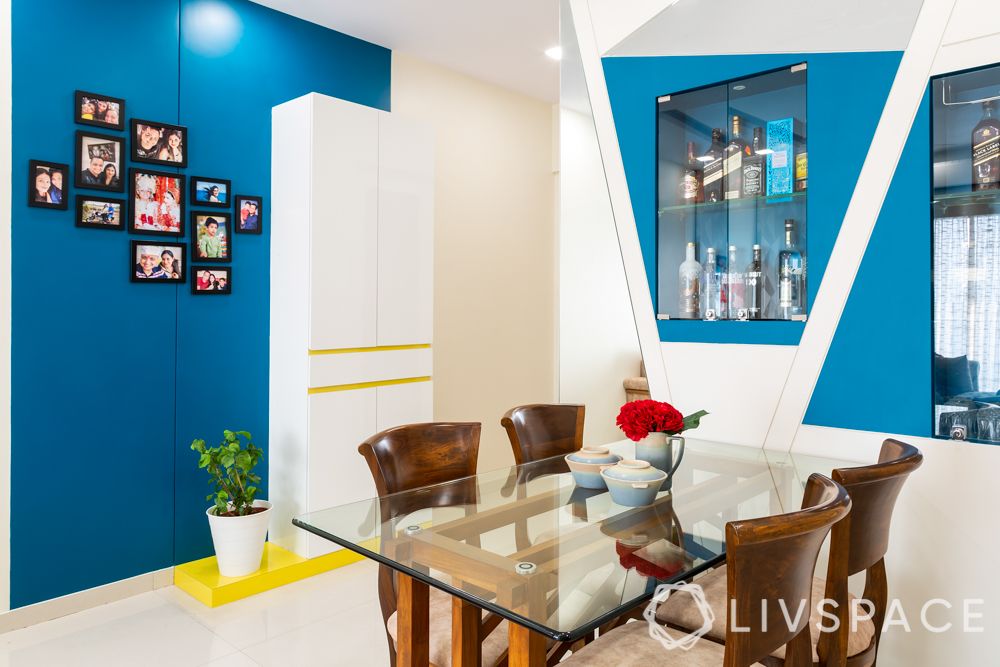 small-house-design-plans-tall-crockery-unit-white-blue-walls-dining area  