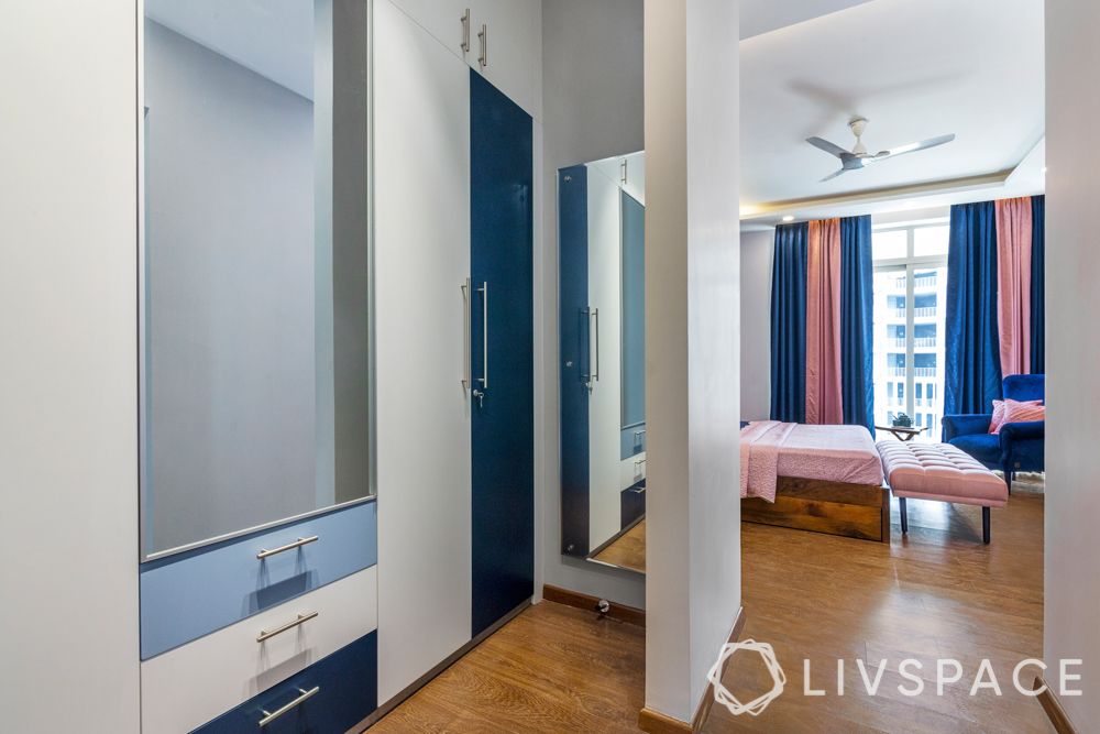 wardrobe-design-with-dressing-table-two-mirrors-blue-and-white-finish