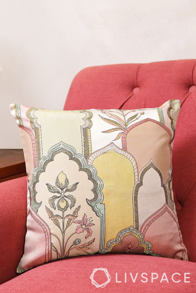 printed-throw-pillow-cushion-with-pink-couch