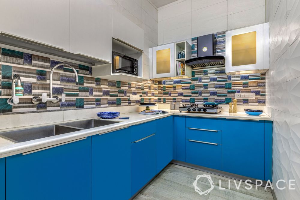 small kitchen designs-blue cabinets-profile lighting-backsplash