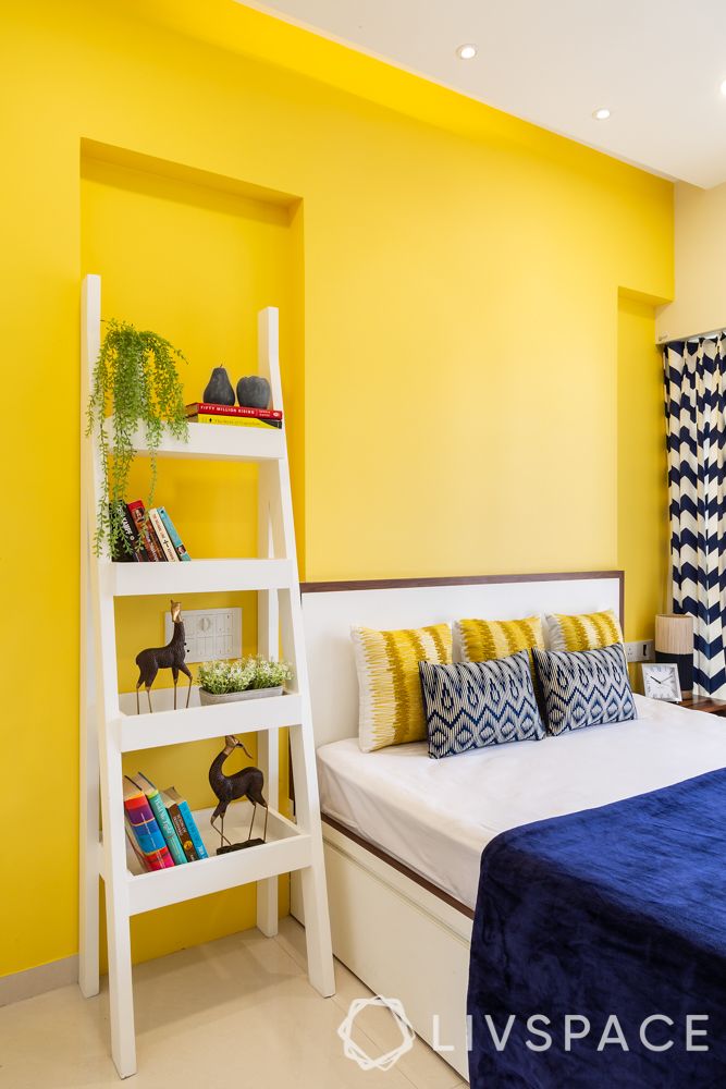 home-furniture-blue-sheets-yellow-walls 