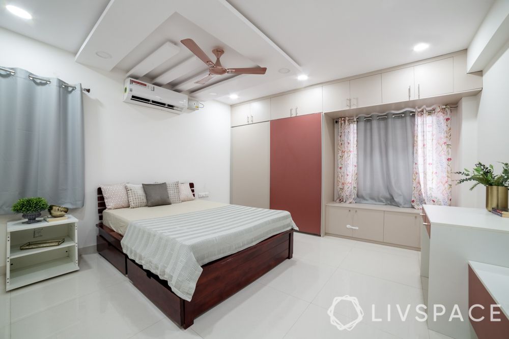 interior-design-for-3-BHK-master-bedroom-sliding-laminate-wardrobe-bay-window-bed-table