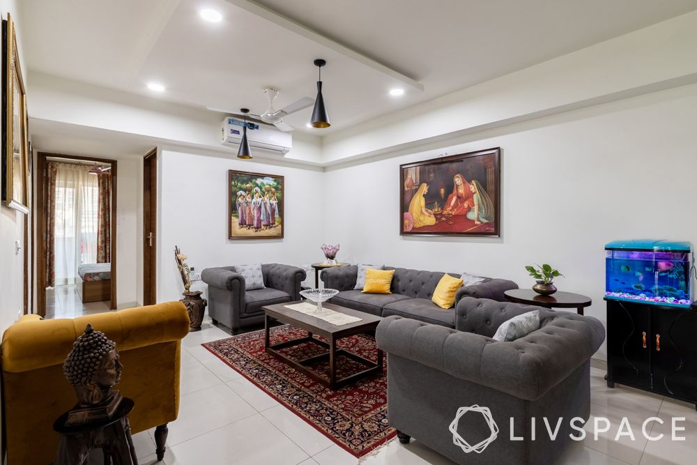 3-bhk-in-gurgaon-living-room-grey-sofa-armchair-mustard-chaise-lounger