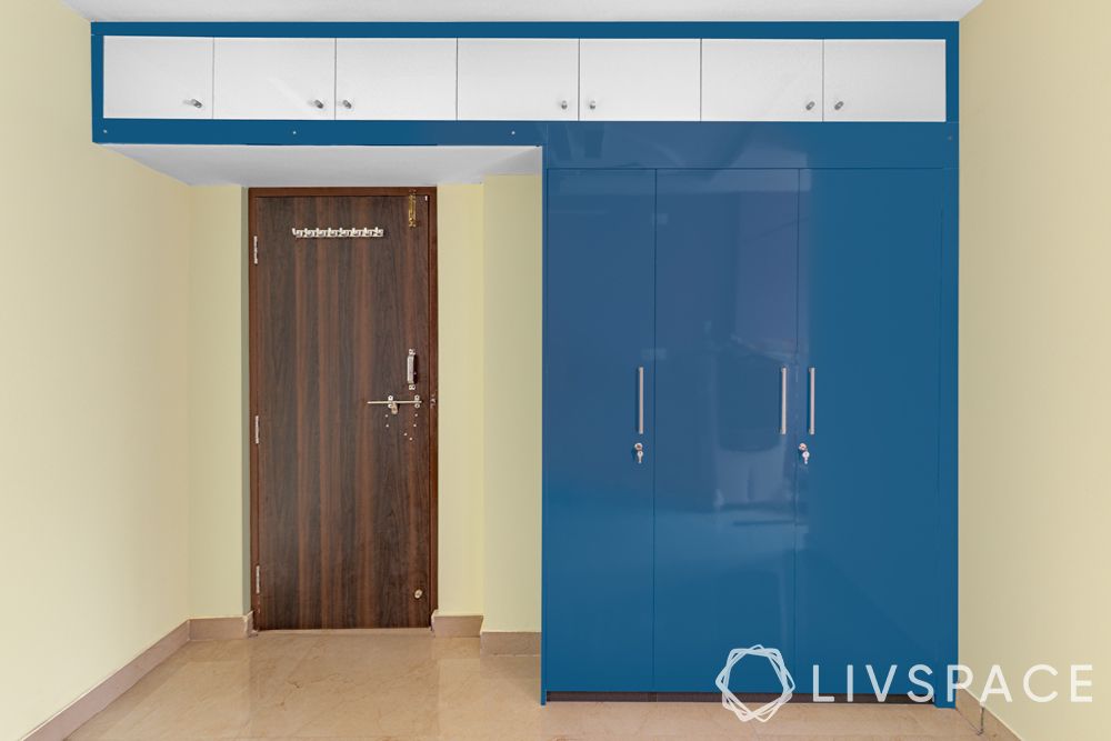 2bhk-flat-in-hyderabad-blue-wardrobe-running-loft
