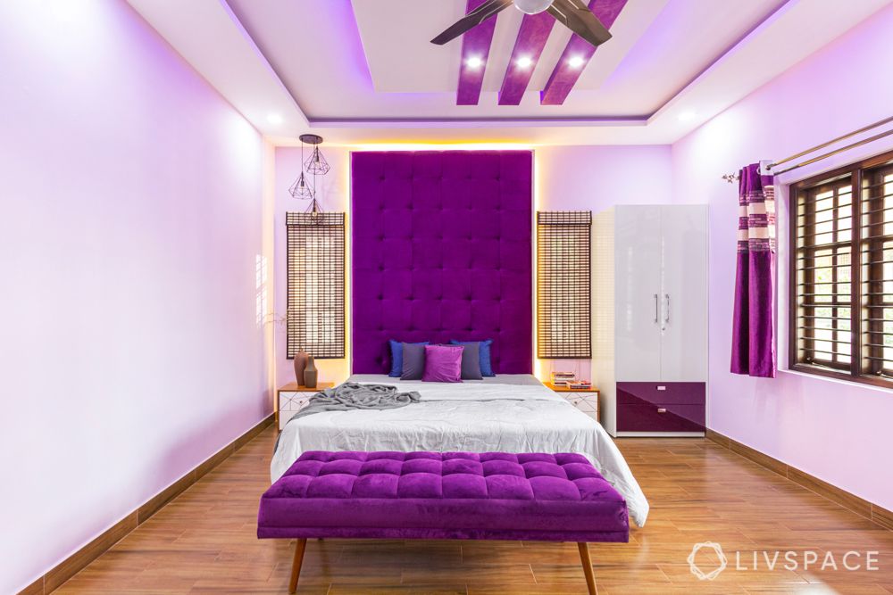 purple-bedroom-wood-laminate-flooring-floor-to-wall-headboard-modular-furniture