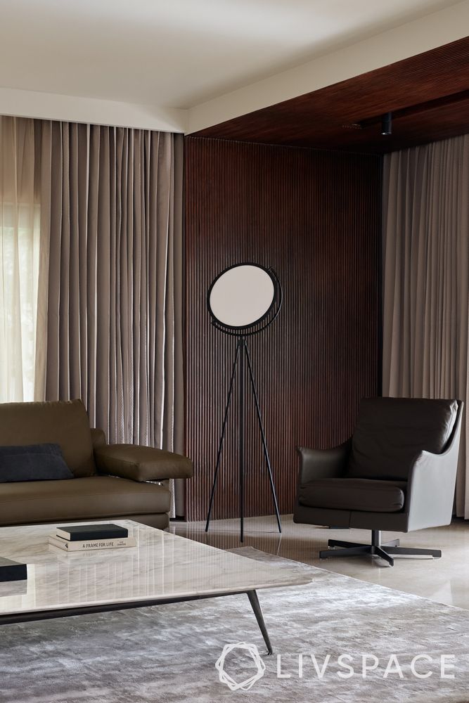luxury-modern-villa-formal-living-room-fluted-walls-seating