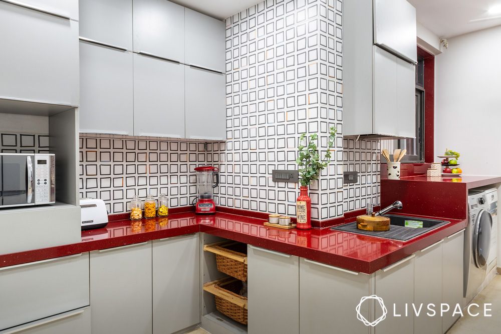 red-kitchen-counter-with-square-wall-design