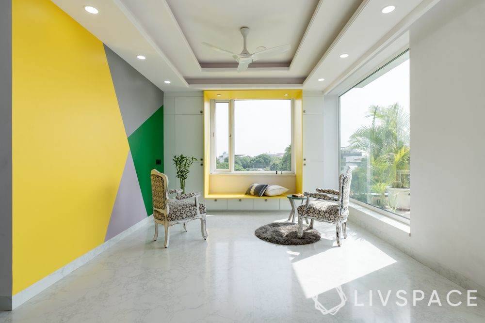 3bhk-flat-design-in-gurgaon-wallpaper-yellow-multicolour-bay-window-living-room