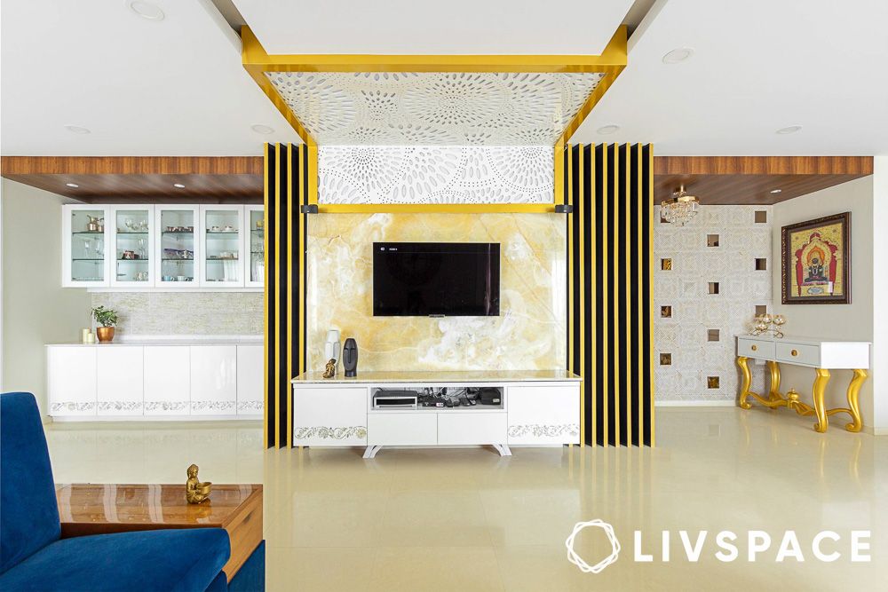 jaali design with pop for tv unit in a living room