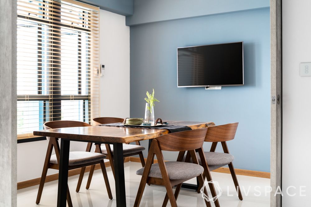 decor-for-dining-table-wooden-chairs-blue-wall