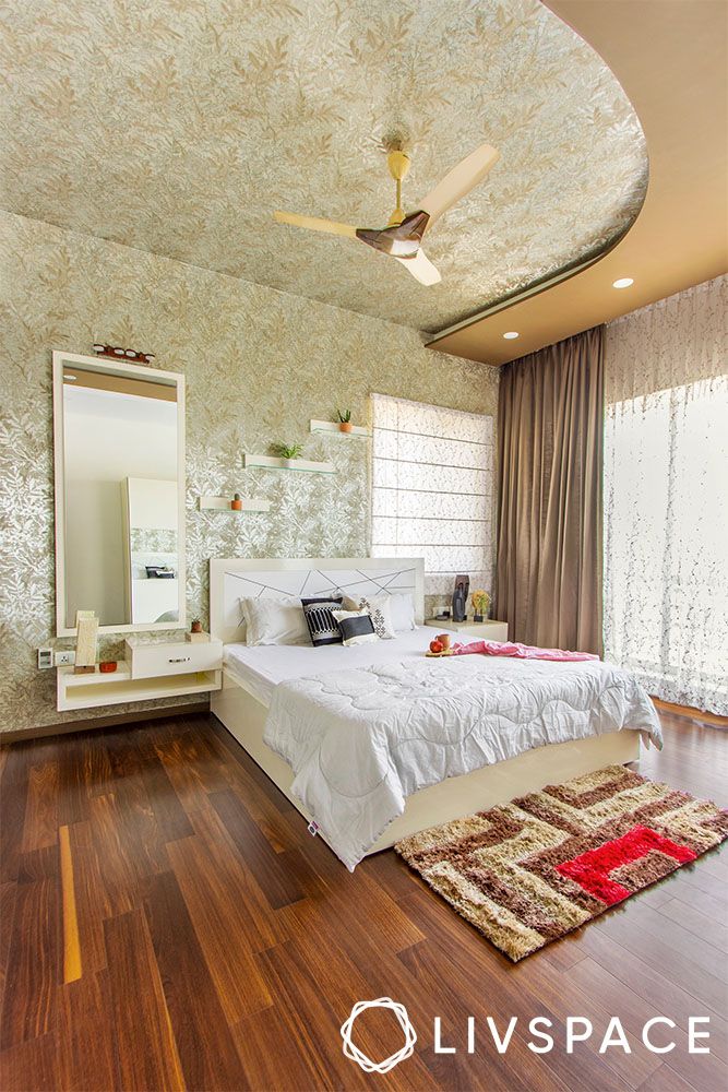 master-bedroom-false-ceiling-design-with-curvy-details