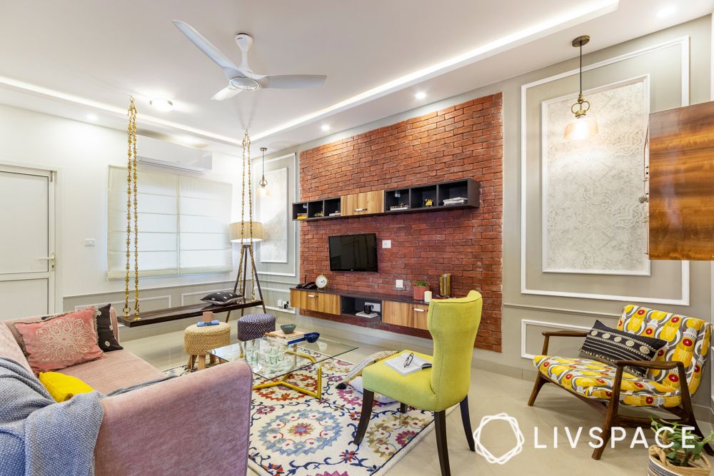 sobha-aspire-living-room-laminate-tv-unit-exposed-brick-wall-3-bhk-room-design