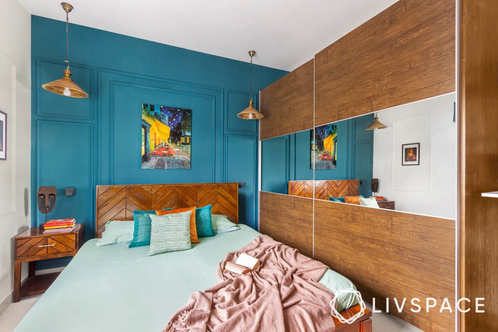 sobha-aspire-master-bedroom-turquoise-wall-laminate-sliding-wardrobes