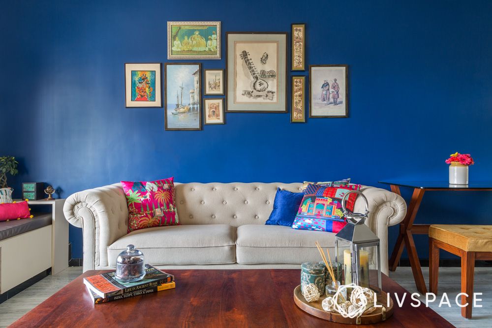 dark-blue-accent-wall-with-wall-art
