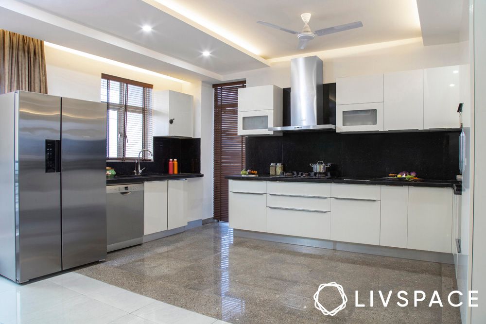 pop-design-for-ceilings-in-white-kitchen-with-black-dado