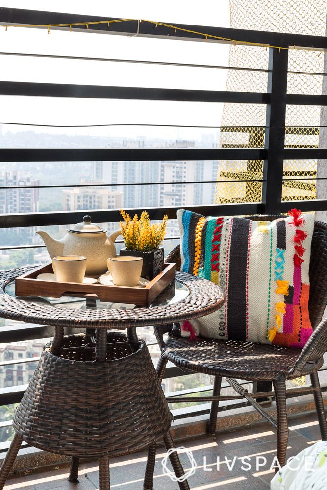 small-balcony-design-mumbai-homes-with-rattan-furniture