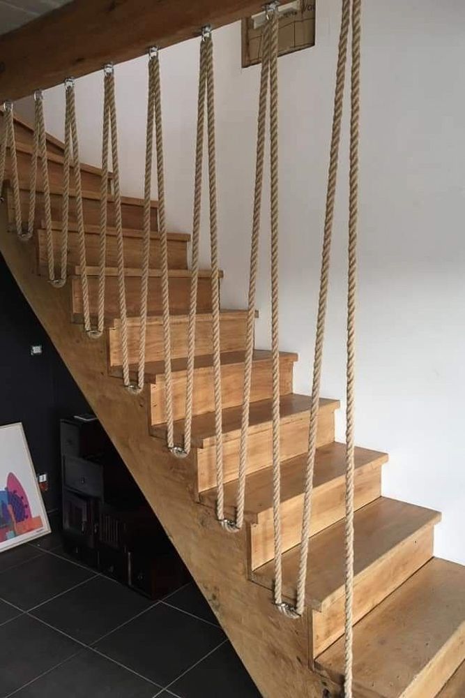 floating stair handrail design with ropes