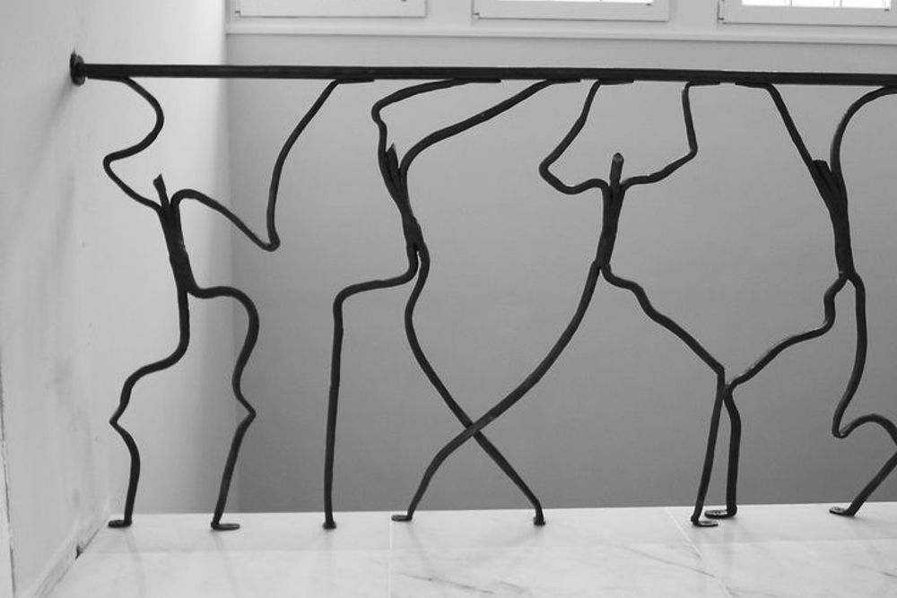 stair handrail design with human figures