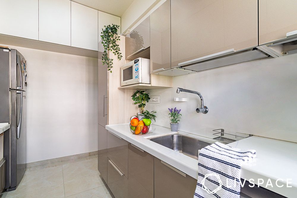 white-modular-kitchen-renovation-in-pune-with-kitchen-plants