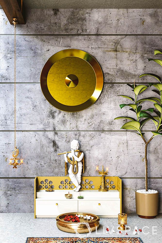 open-concept-pooja-room-design-with-golden-wall-thali