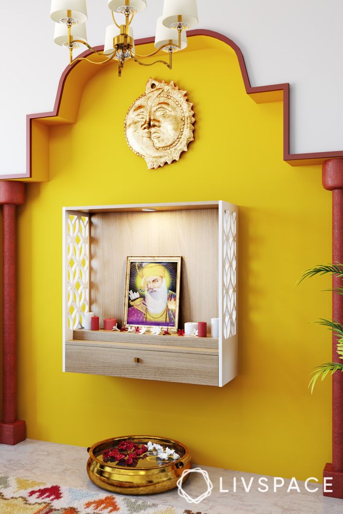 square-wall-mounted-mandir-against-yellow-accent-wall