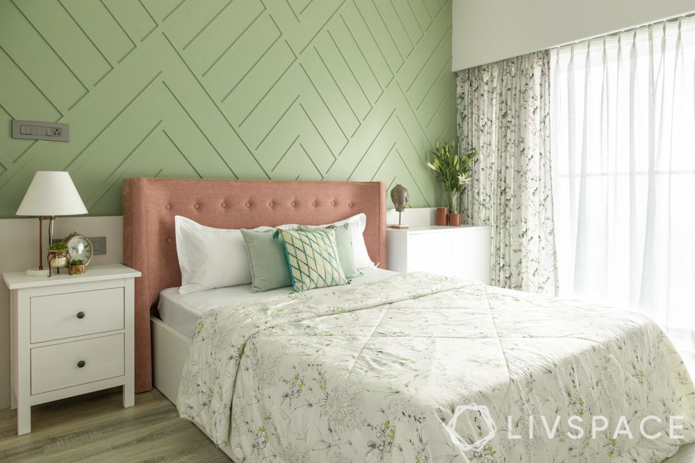 2bhk-interior-cost-of-bedroom-with-green-headboard-wall