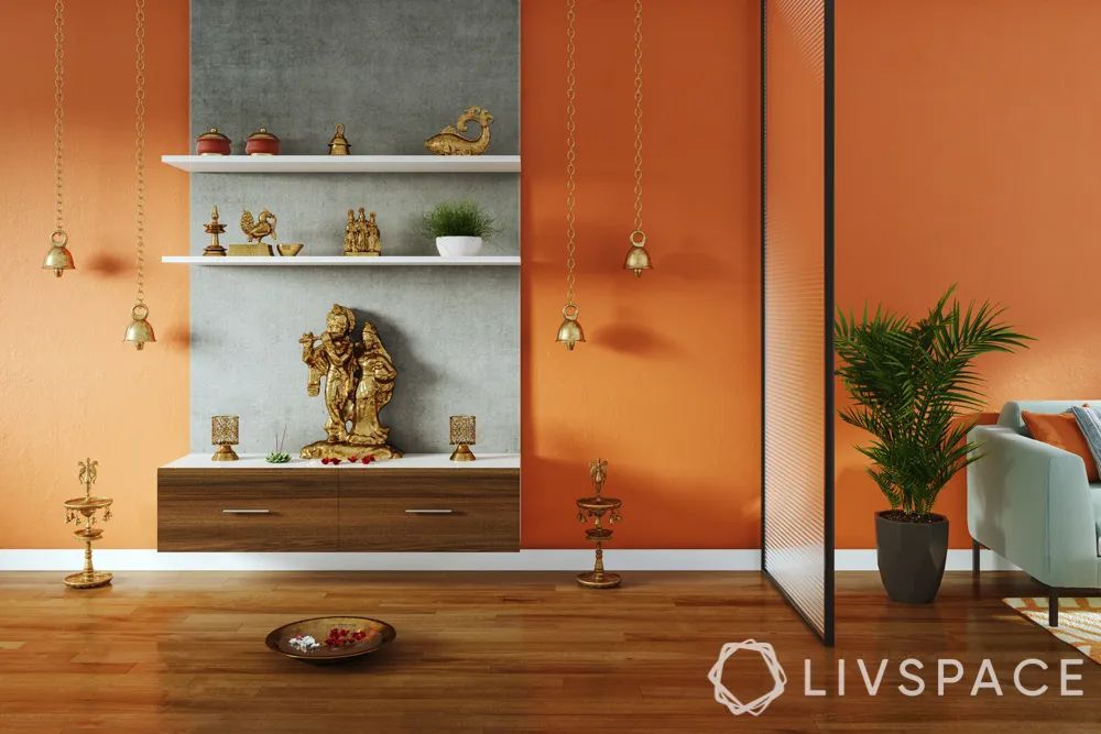 wooden-temple-for-home-in-living-room-with-partition-orange-accent-wall-bells