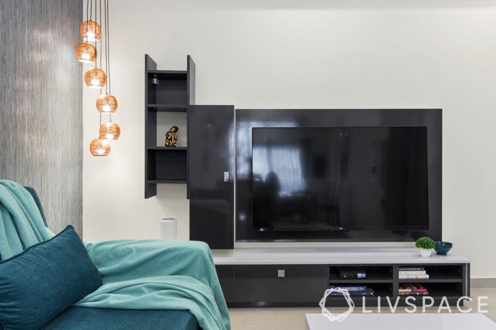 black-tv-unit-design-ideas-with-teal-sofa