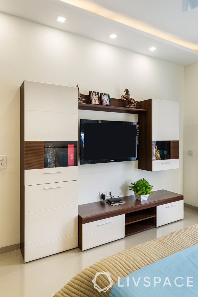 modern-tv-wall-design-with-concealed-storage-and-spotlights