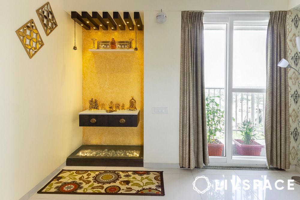 mandir design in wall with rafters and accent wall