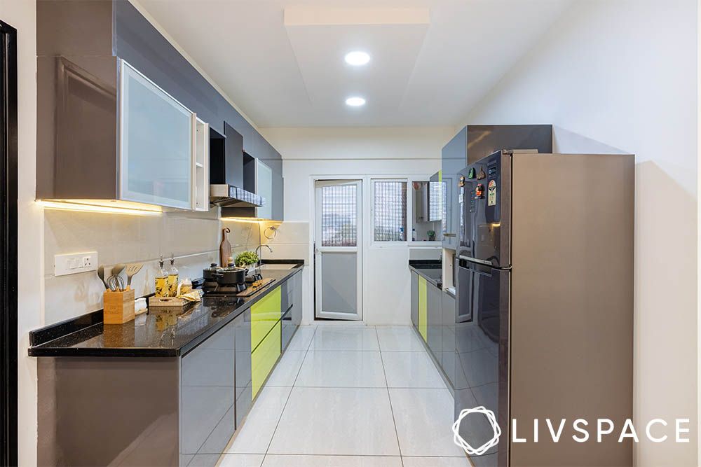 vastu-approved-parallel-kitchen-in-lemon-yellow-and-grey