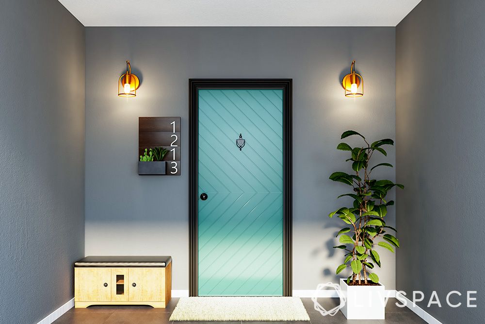 blue-main-door-with-doormat-for-entrance-vastu