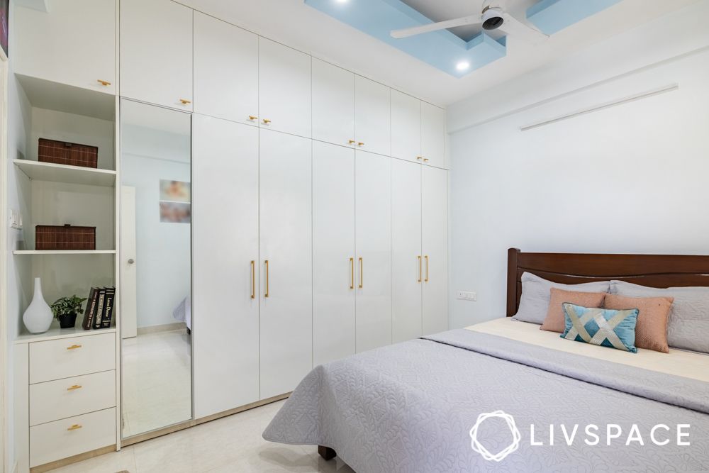 rsun-clover-flat-interior-design-bangalore-with-white-master-bedroom-and-wardrobe-with-dresser