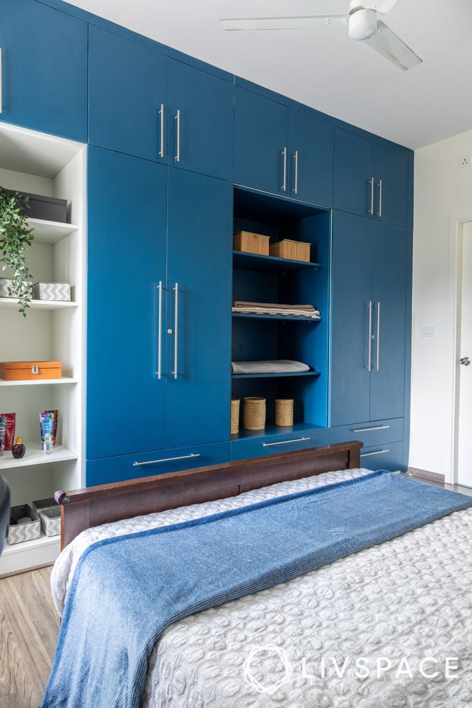 3bhk-interior-design-in-subramanyapura-bengaluru-with-blue-wardrobe-and-shelves