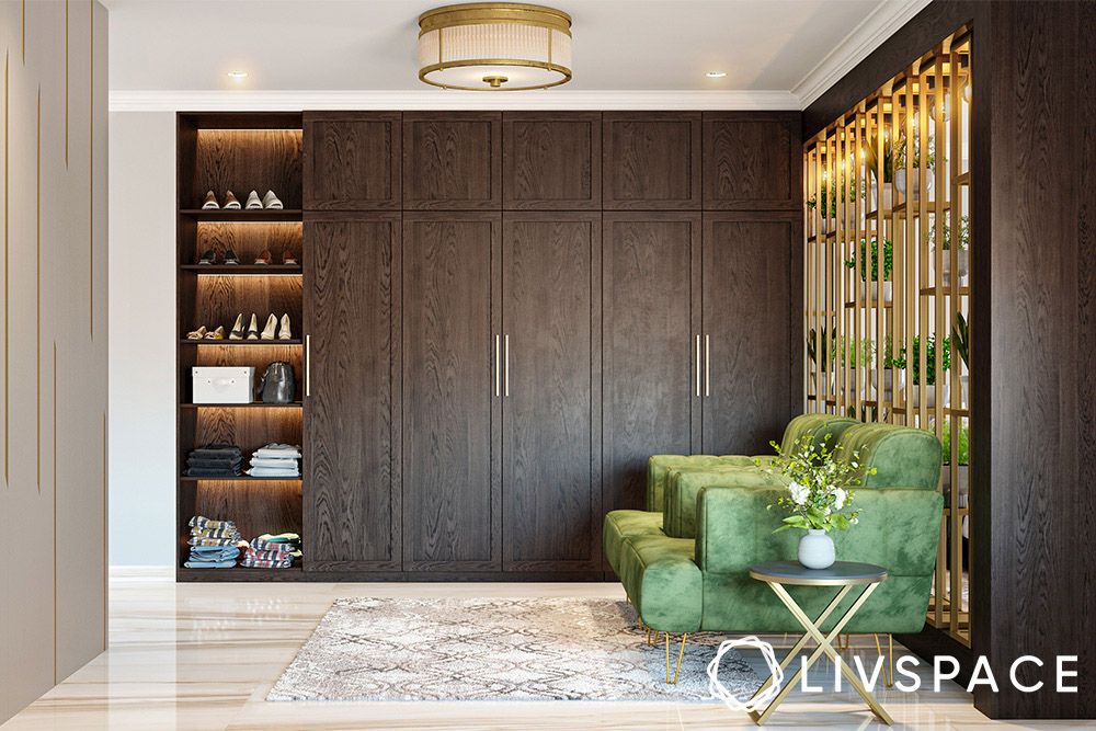 brown-veneer-wardrobe-materials-and-gold-metal-partition-and-green-armchair