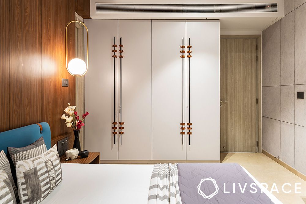 wardrobe-materials-in-metal-and-leather-with-wood-accent-wall