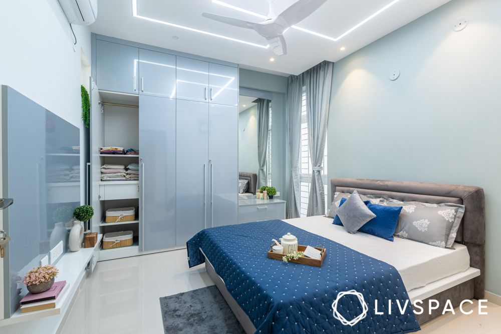 interior-design-for-pacifica-aurum-villas-with-blue-bedroom-wardrobe-and-dresser