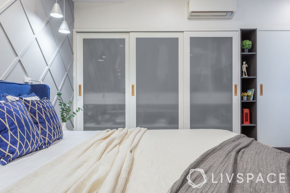 frosted-glass-wardrobe-shutters-with-display-racks