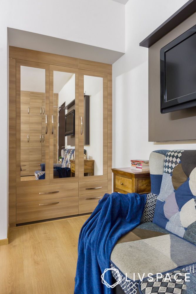 light-wood-swing-wardrobe-with-mirrors-and-drawers