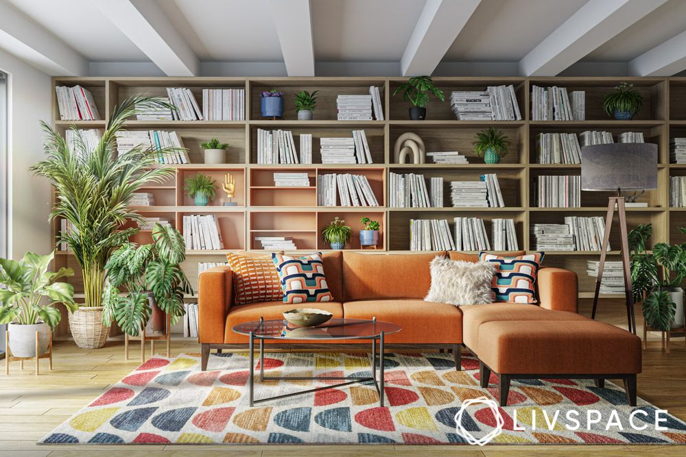 interior-design-vintage-modern-living-room-with-plants-bookshelf-orange-sofa