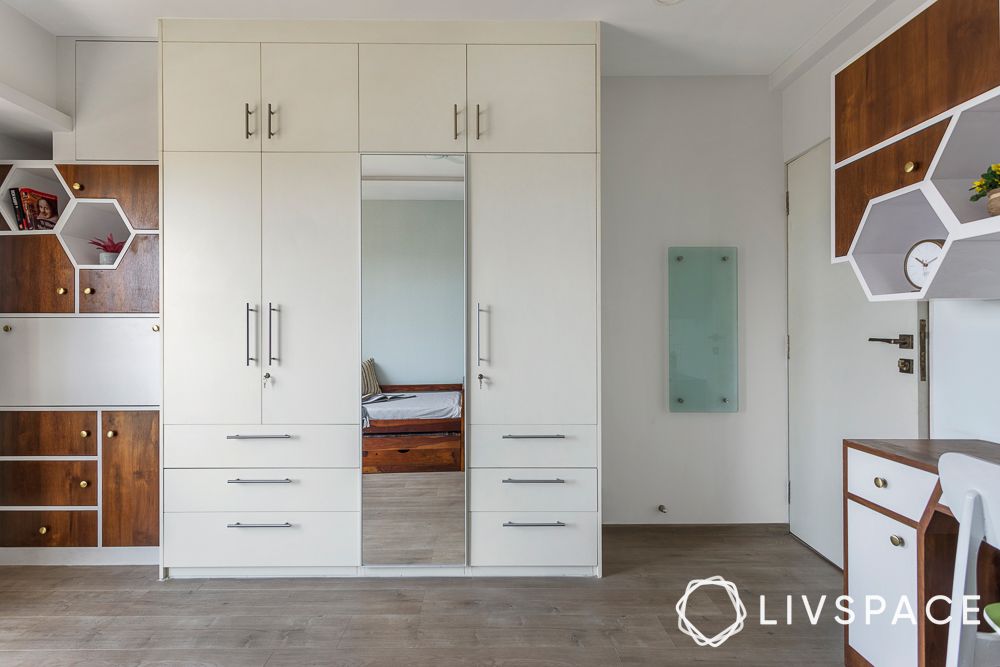minimal-white-swing-door-almirah-design-with-mirror