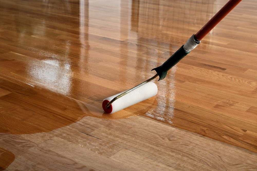 wood-floor-polish-being-applied