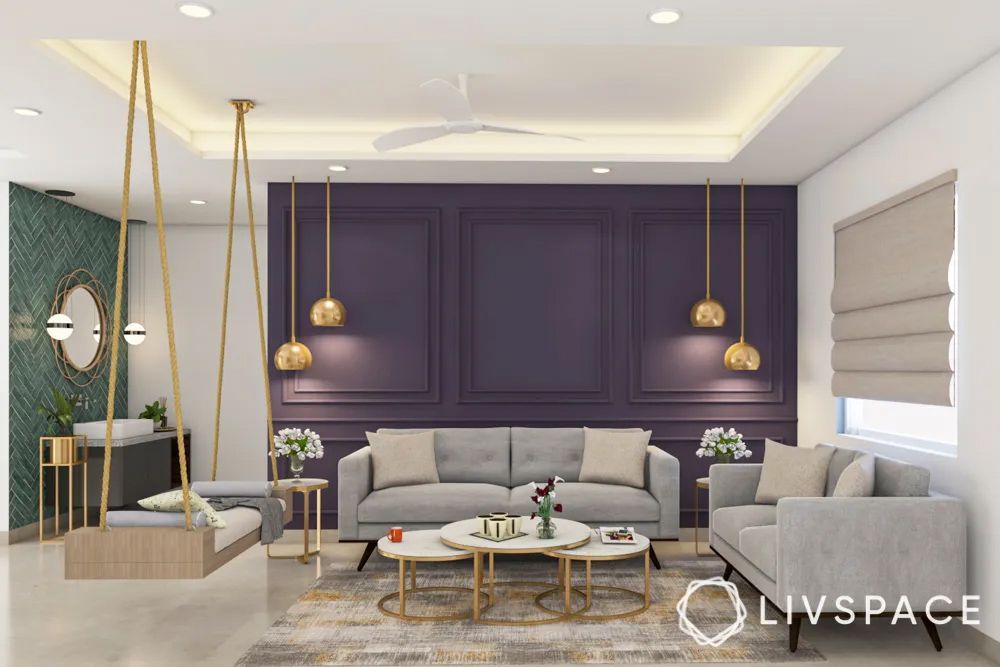 purple-and-neutral-hall-colour-combination-with-swing-seating-and-lighting