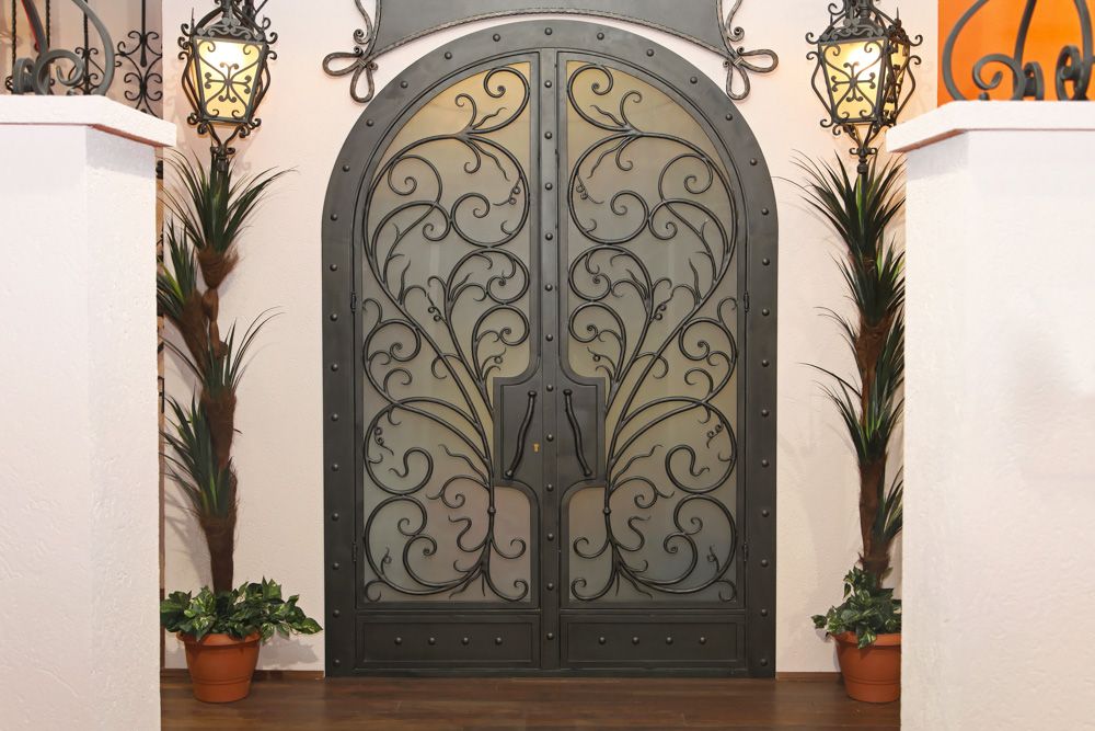 main-door-design-with-intricate-ironwork-and-lights