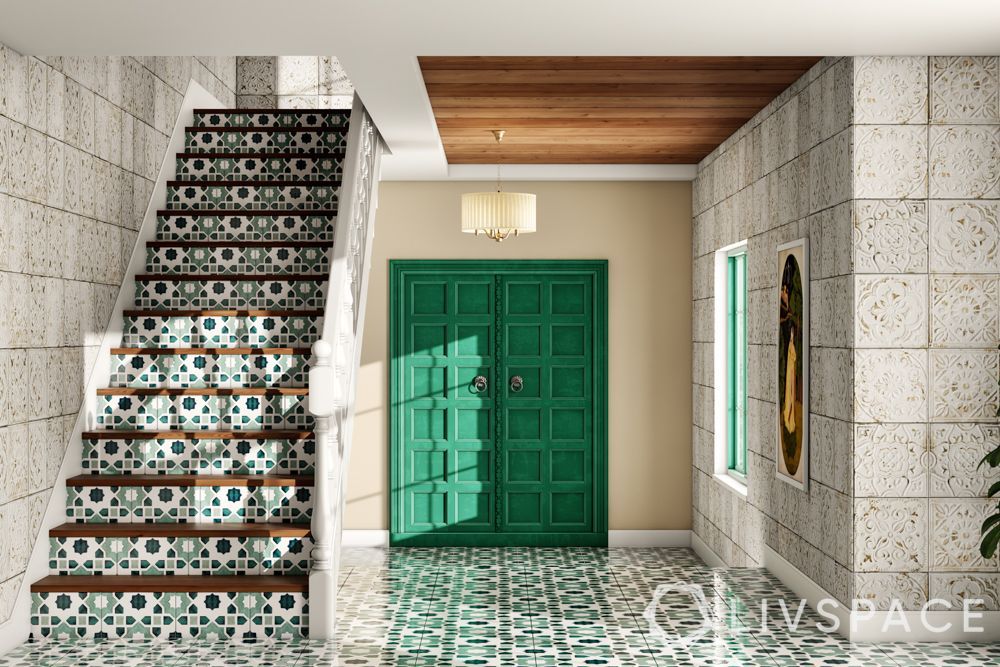 green-main-door-design-beside-staircase