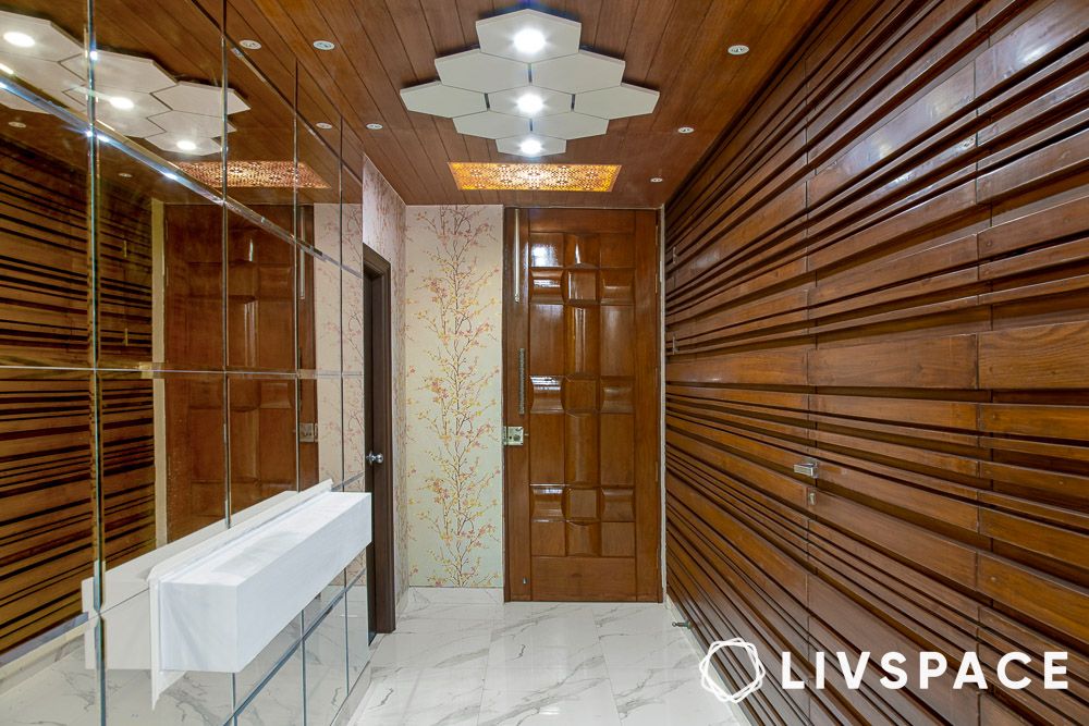 wooden entrance of house according to vastu