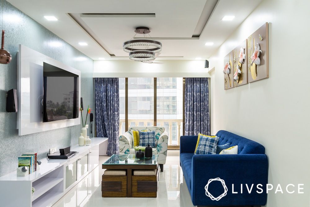 interior-cost-for-2bhk-in-mumbai-with-blue-sofa-tv-unit-lighting