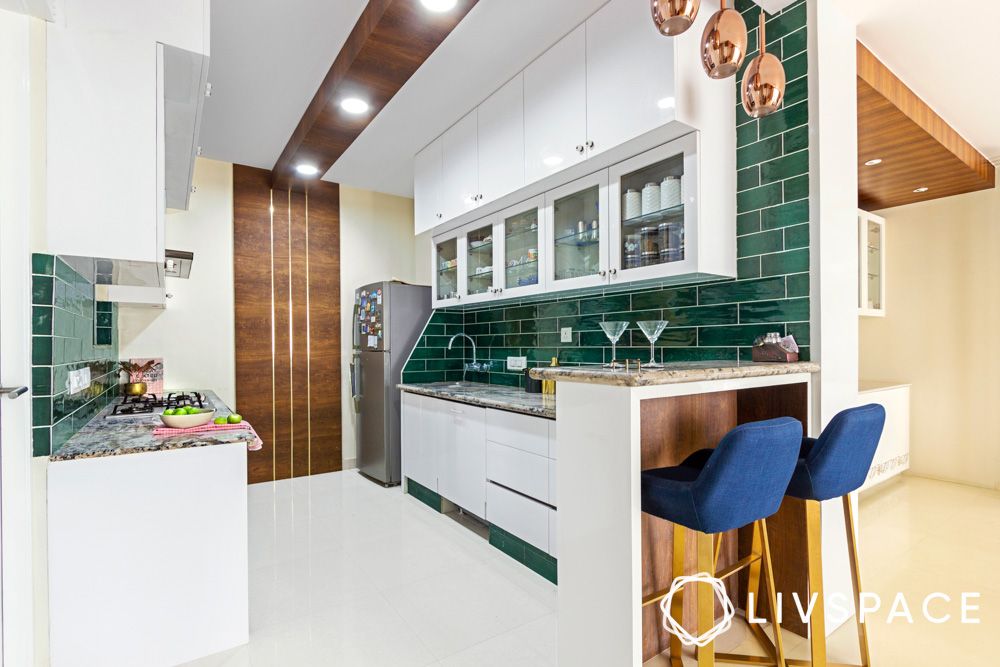 modern-white-kitchen-cabinets-with-green-backsplash-breakfast-bar