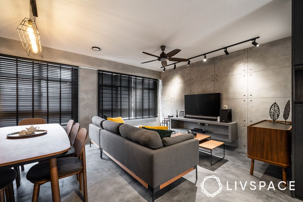 neutral-living-room-with-grey-sofa-ips-flooring-and-textured-wall