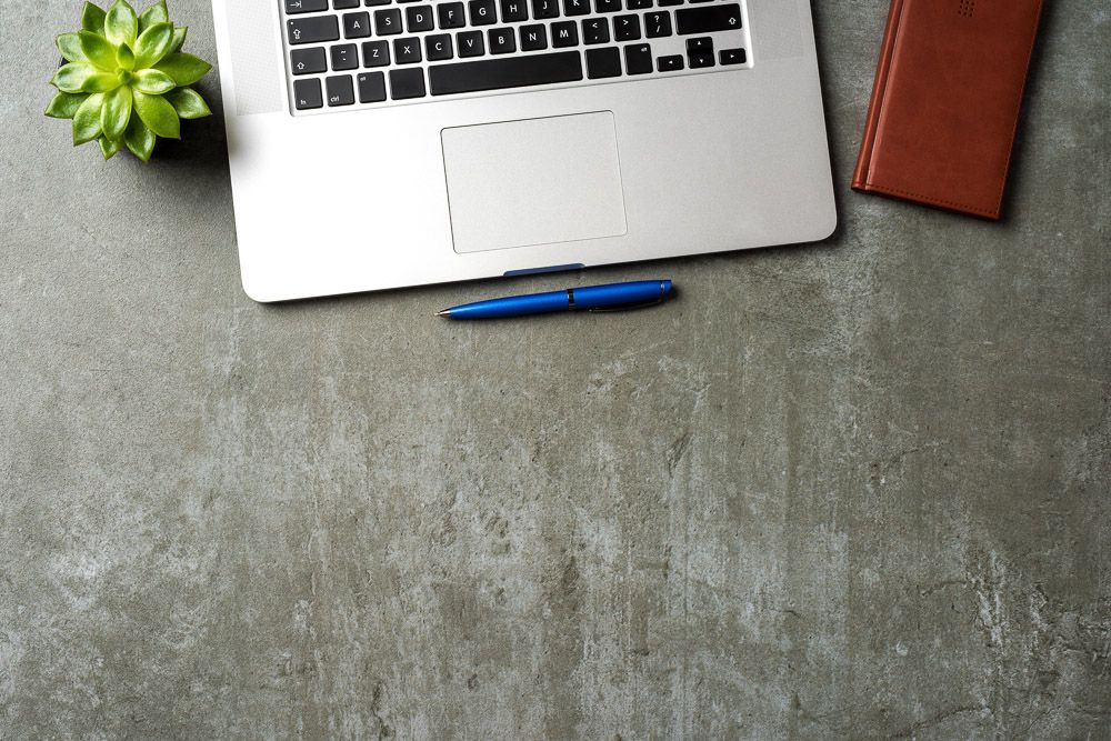 concrete-commercial-interior-design-with-laptop